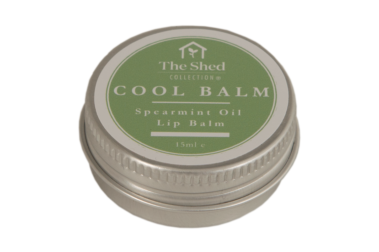 A round metal tin of The Shed Collection Cool Balm Spearmint Oil Lip Balm, featuring a sage green and white label on a clean white background.