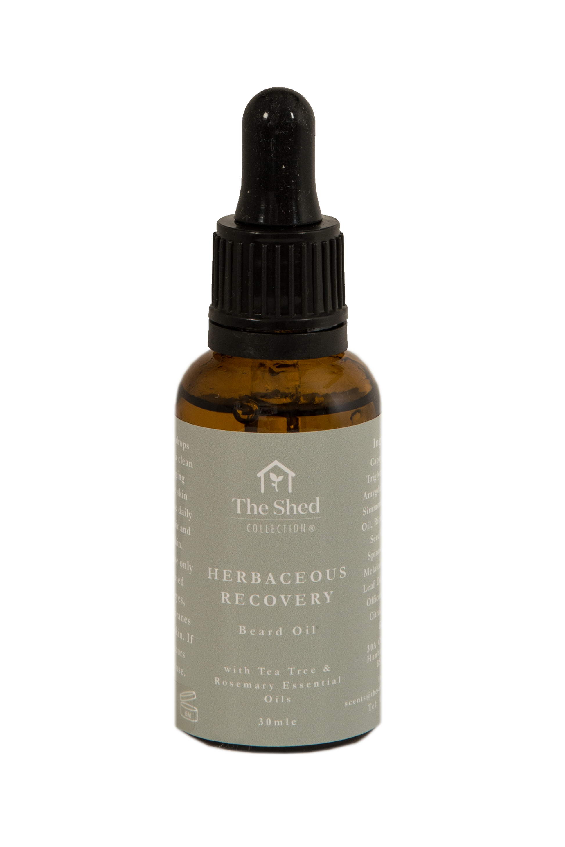 A 30ml amber glass dropper bottle of Herbaceous Recovery - Tea Tree & Rosemary beard oil by The Shed Collection, featuring a black dropper cap and a light green label with white text.