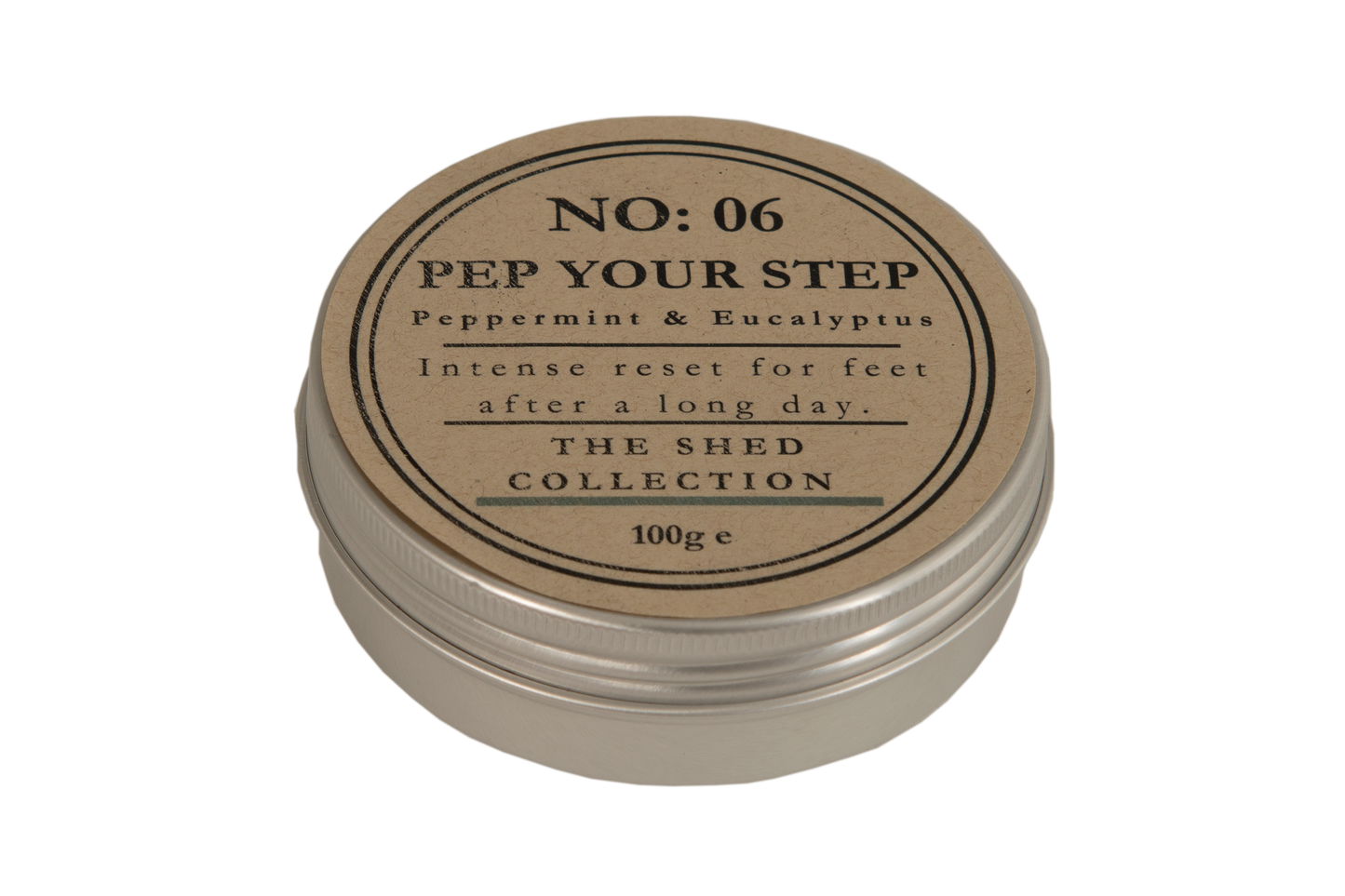 A round metal tin of Peppermint & Eucalyptus foot reset balm by The Shed Collection, featuring a kraft paper label with black text.