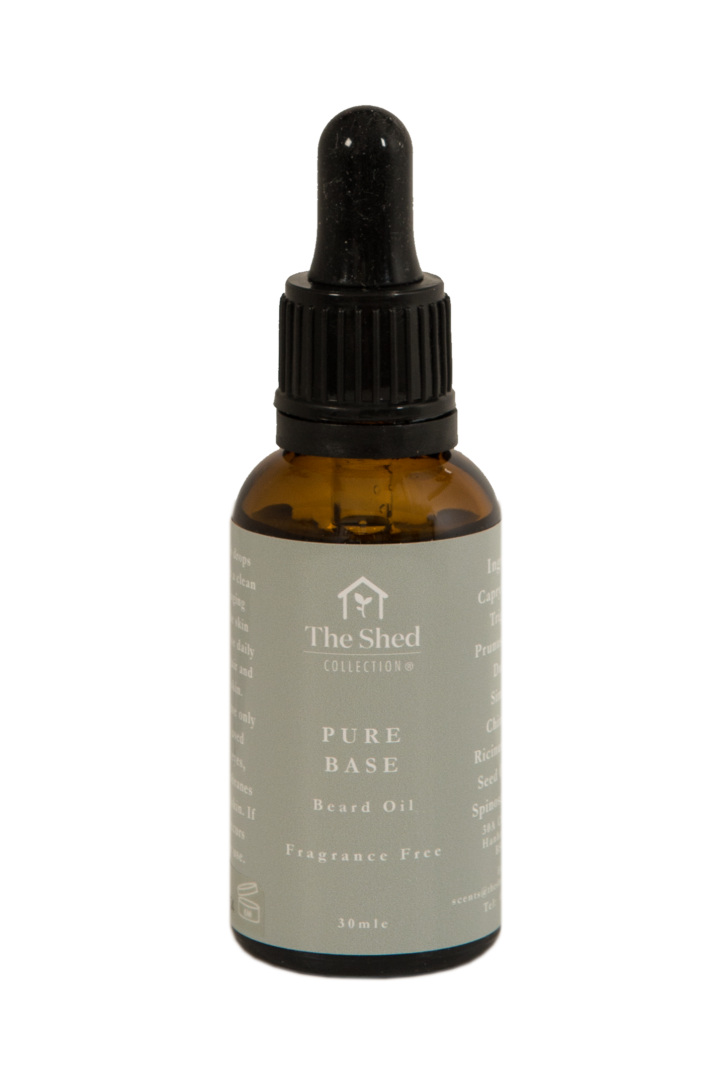 A 30ml amber glass dropper bottle of Pure Base, fragrance free beard oil by The Shed Collection, featuring a black dropper cap and a light green label with white text.