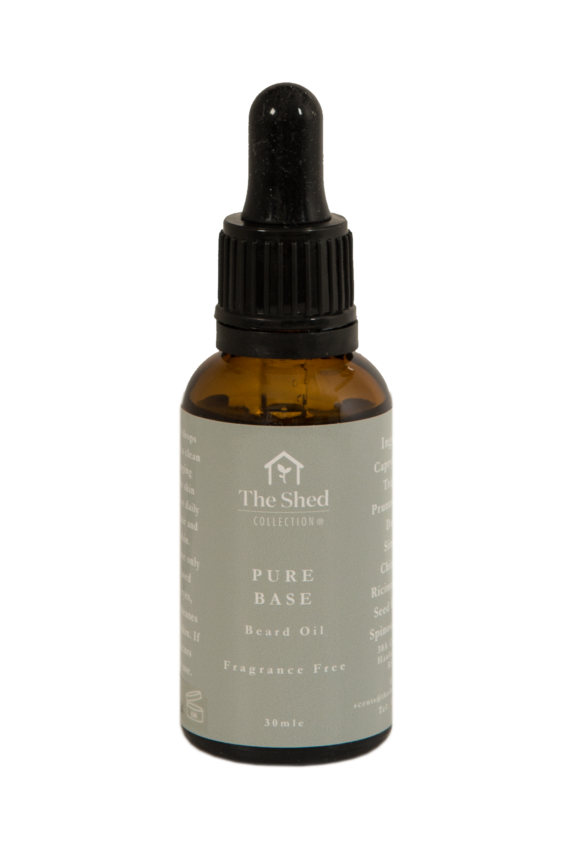 A 30ml amber glass dropper bottle of Pure Base, fragrance free beard oil by The Shed Collection, featuring a black dropper cap and a light green label with white text.