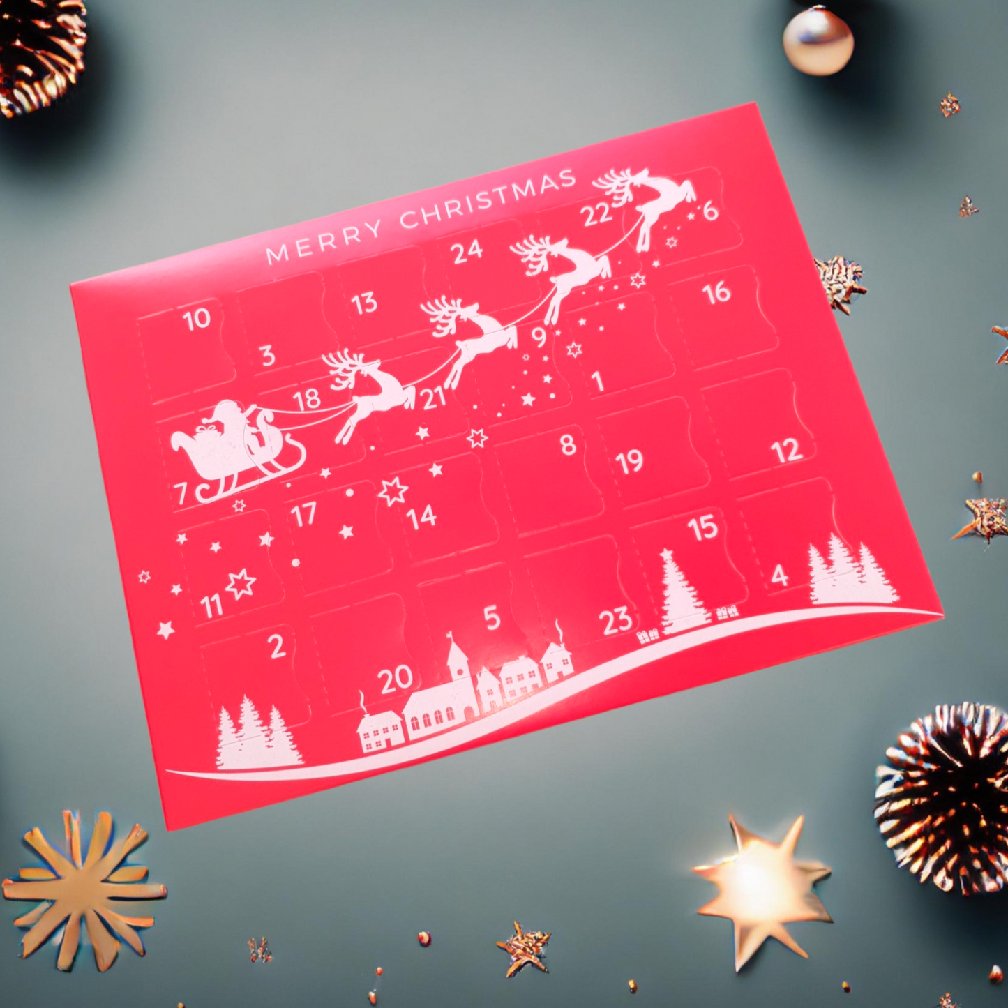 Red advent calendar with white reindeer and Santa Claus design, surrounded by Christmas decorations on a dark background.