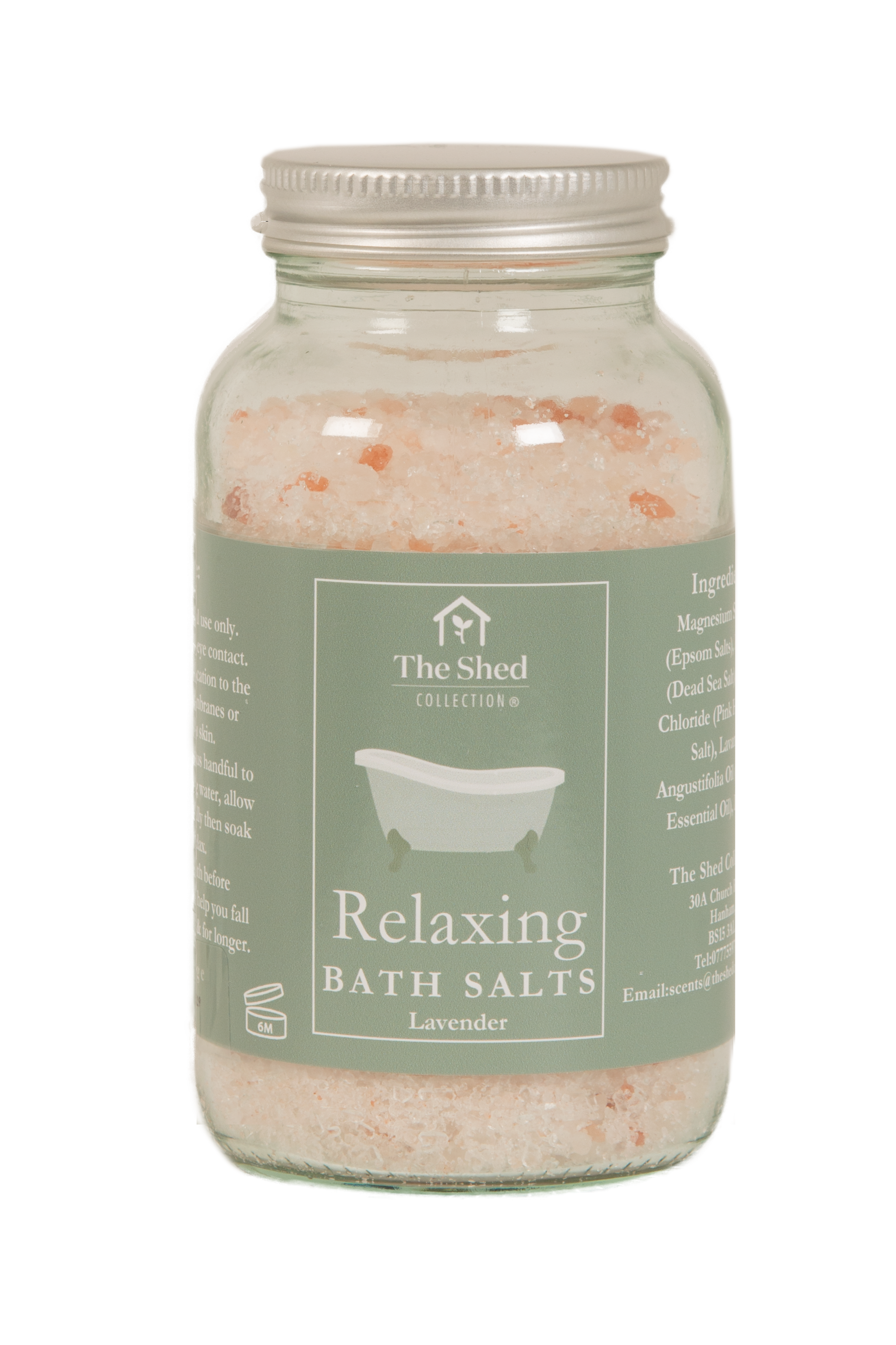 A glass jar filled with lavender bath salts, featuring a sage green label with a white bathtub illustration and a silver metal screw cap, set against a plain white background.