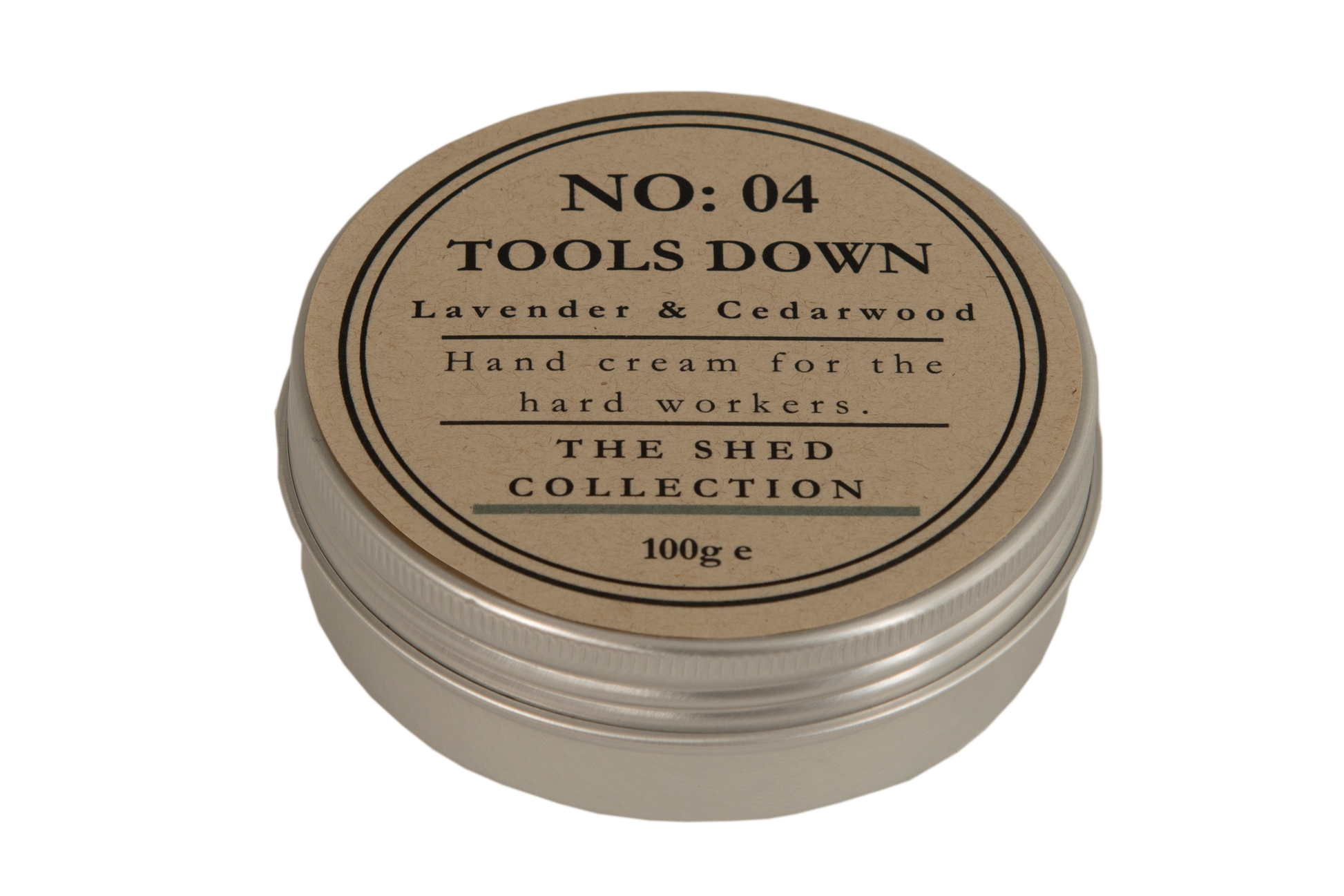 A round metal tin of hand cream with a kraft paper label reading 'NO: 04 TOOLS DOWN Lavender & Cedarwood' and 'THE SHED COLLECTION'.